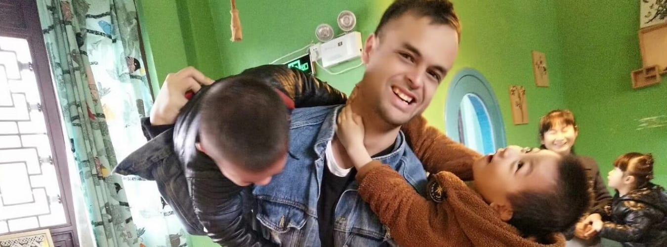 Harold teaching in China with his student